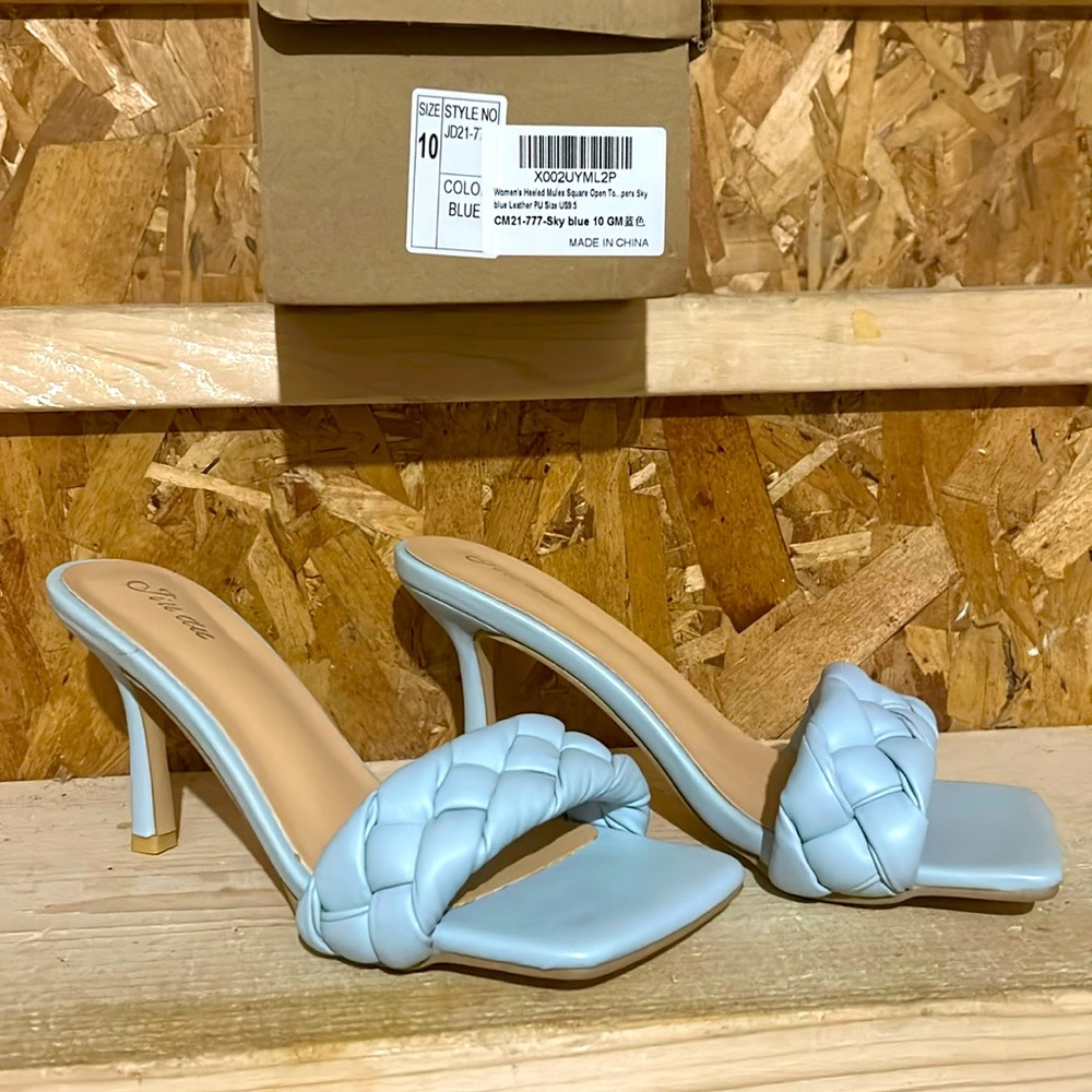 Sky blue slip on mules. Beautifully braided